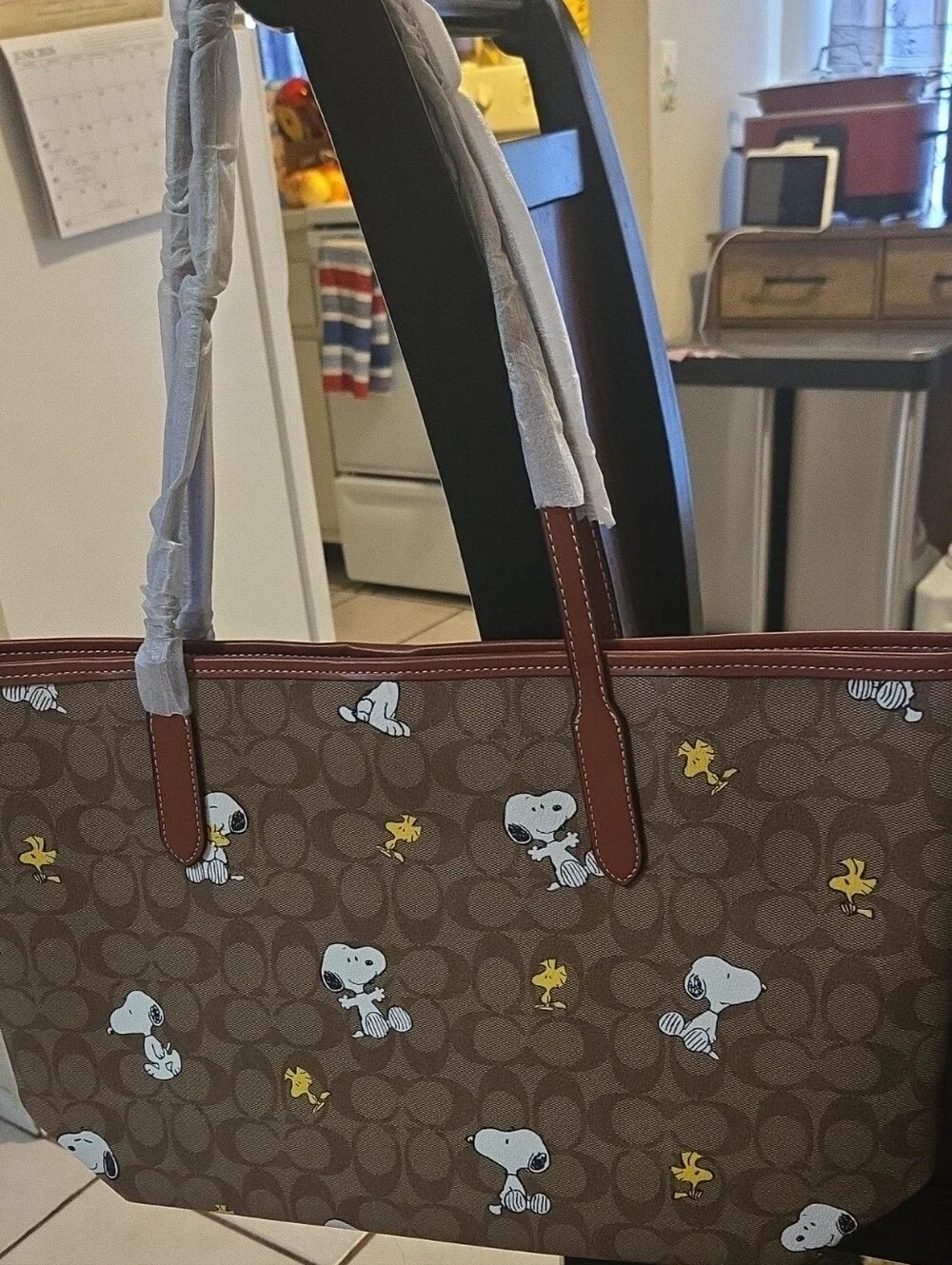 Coach Brown Signature Tote with Snoopy & Yellow Woodstock Print - Picture 1 of 4